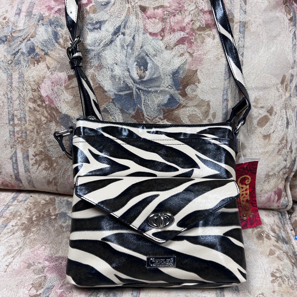 Carlos Santana Zebra Print Crossbody Purse New Without tag . I took it off